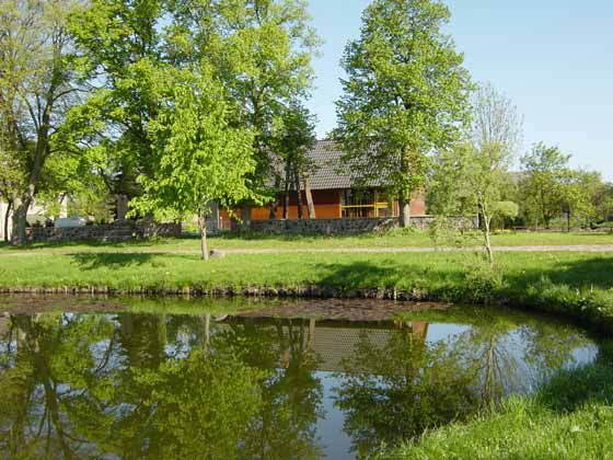 Picture of Church at Kl with village pond