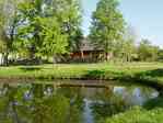 Picture of Church at Kl with village pond