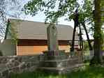 Picture of Kl war memorial with church and bell tower in background